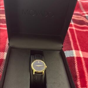 Movado Woman’s  Black and Gold Watch Swiss leather